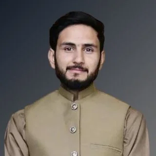 a person with a beard wearing a brown vest